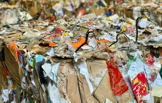 Cardboard being recycled.