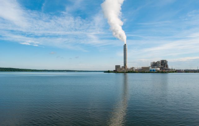 column of smoke out of a factory pipe representing scope 3 reporting